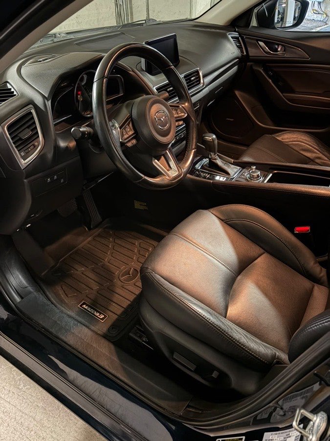 Front seats and driver's floor, after Chrome Detailing cleaned it