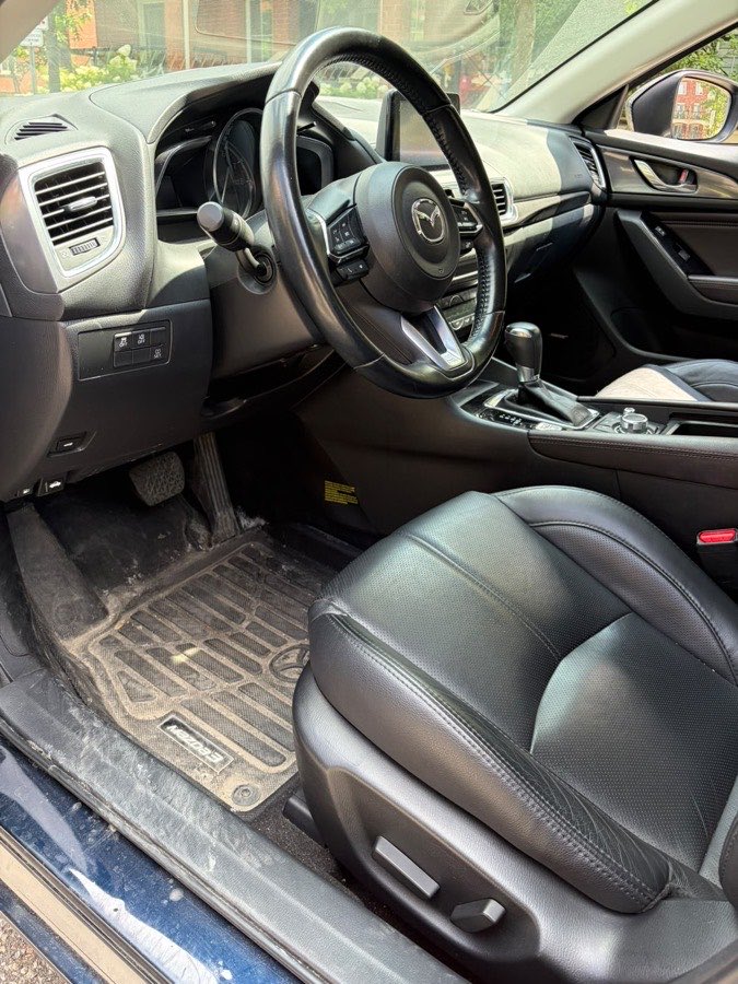 Front seats and driver's floor, before cleaning